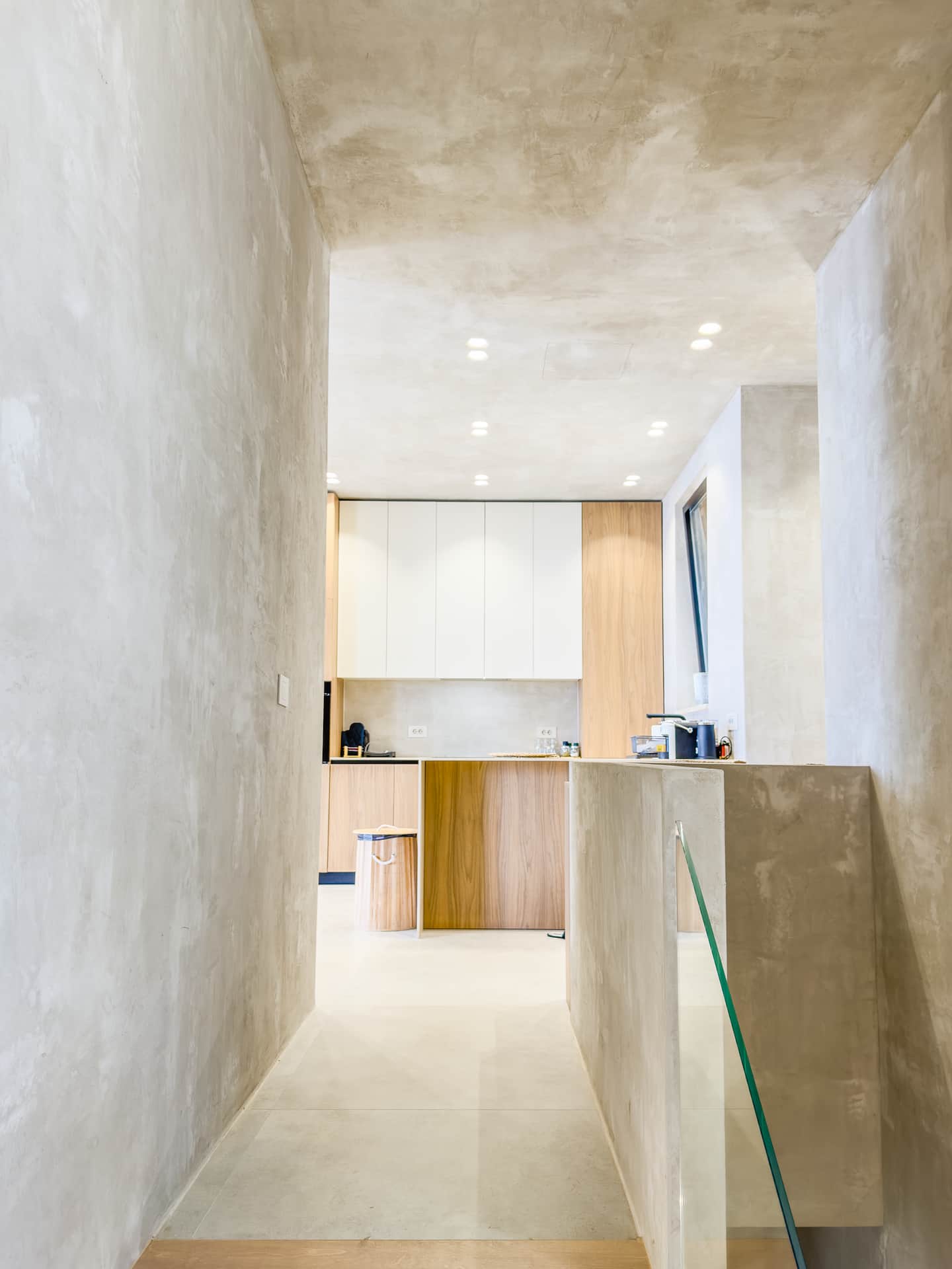 Full kitchen at Villa 4 with oak cabinetry and integrated appliances.