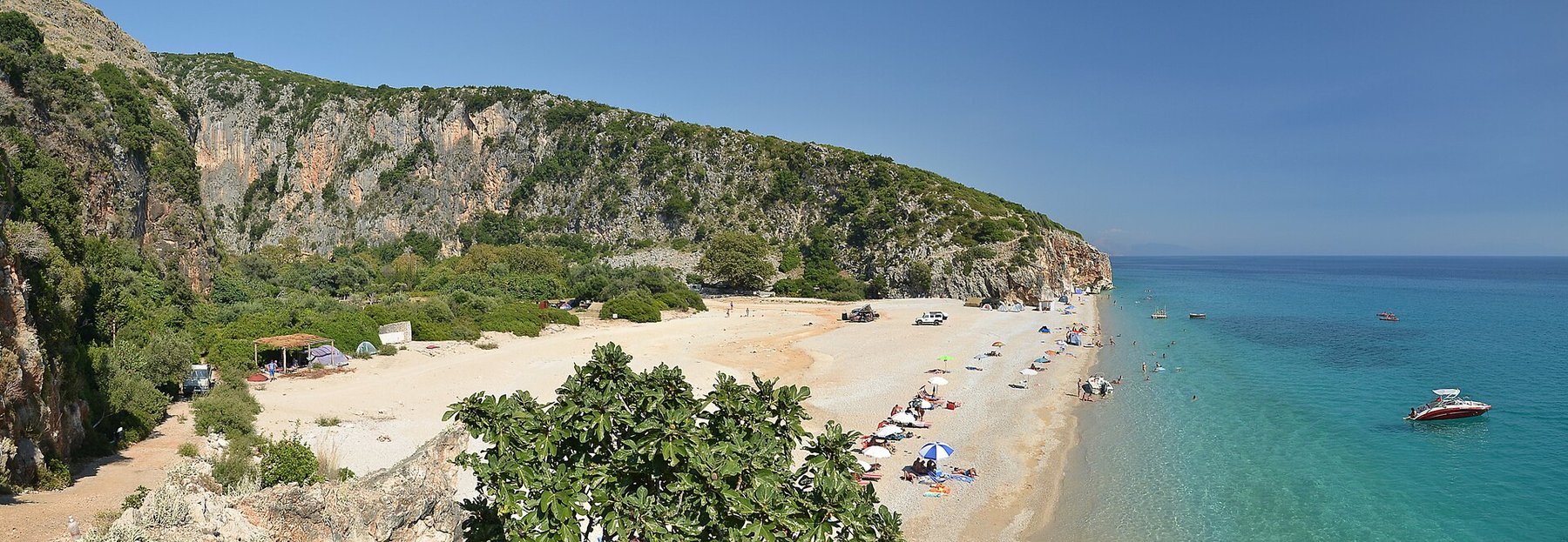 Gjipe Beach — a hidden cove at the foot of a limestone canyon on the Albanian Riviera.